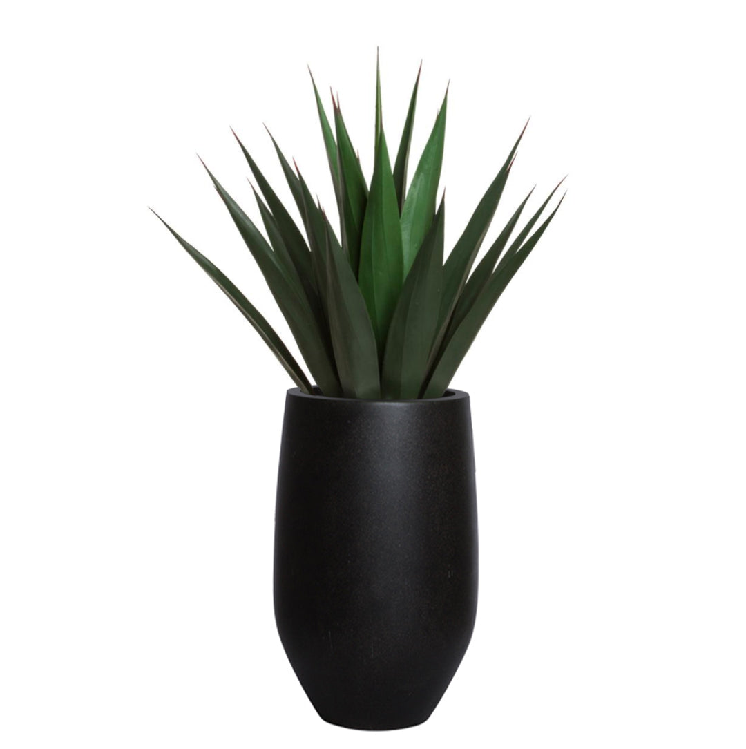 Artificial agave plant with green pointed leaves in a modern black planter