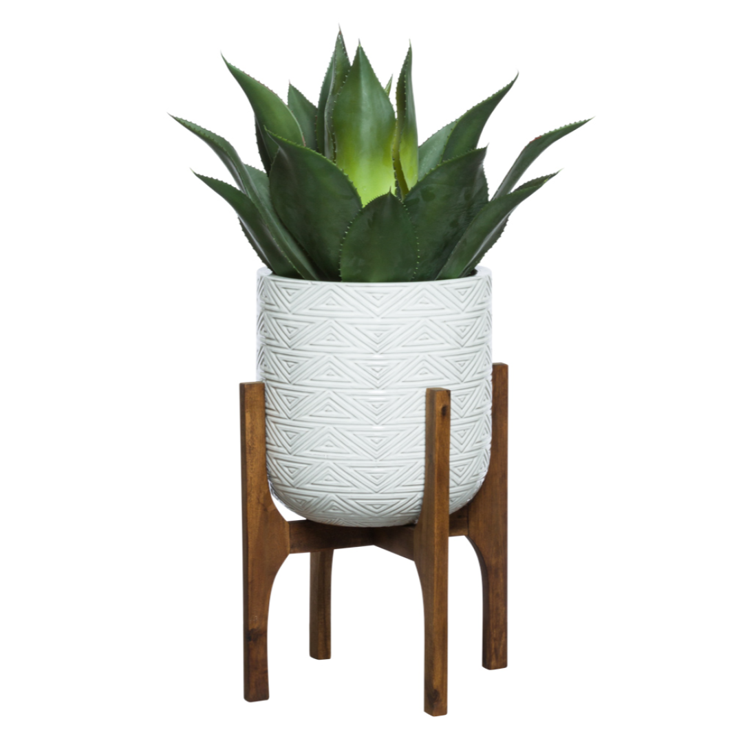 Artificial agave plant in patterned white pot with wooden stand, modern home decor