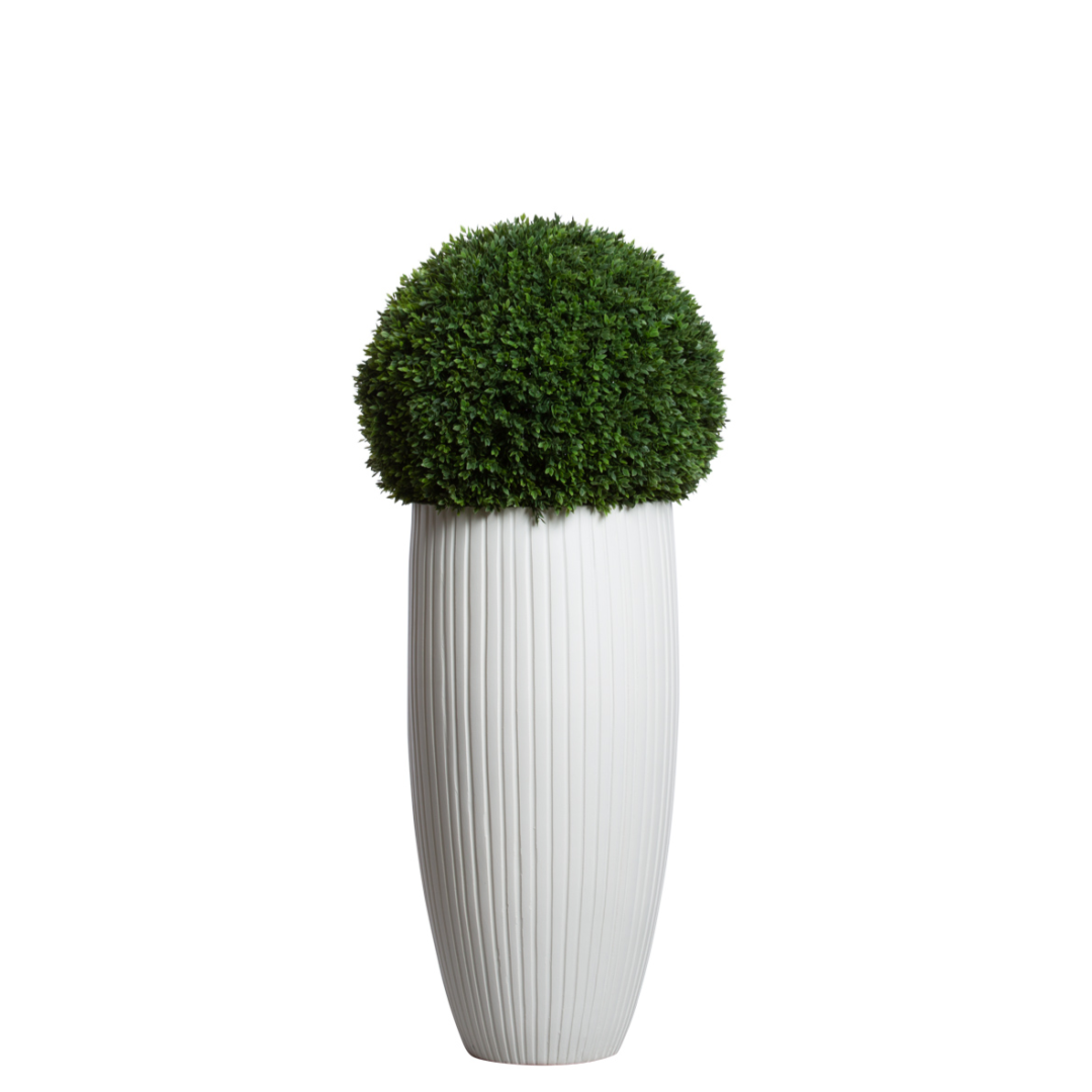Artificial boxwood ball topiary in tall white ribbed planter, modern botanical decor