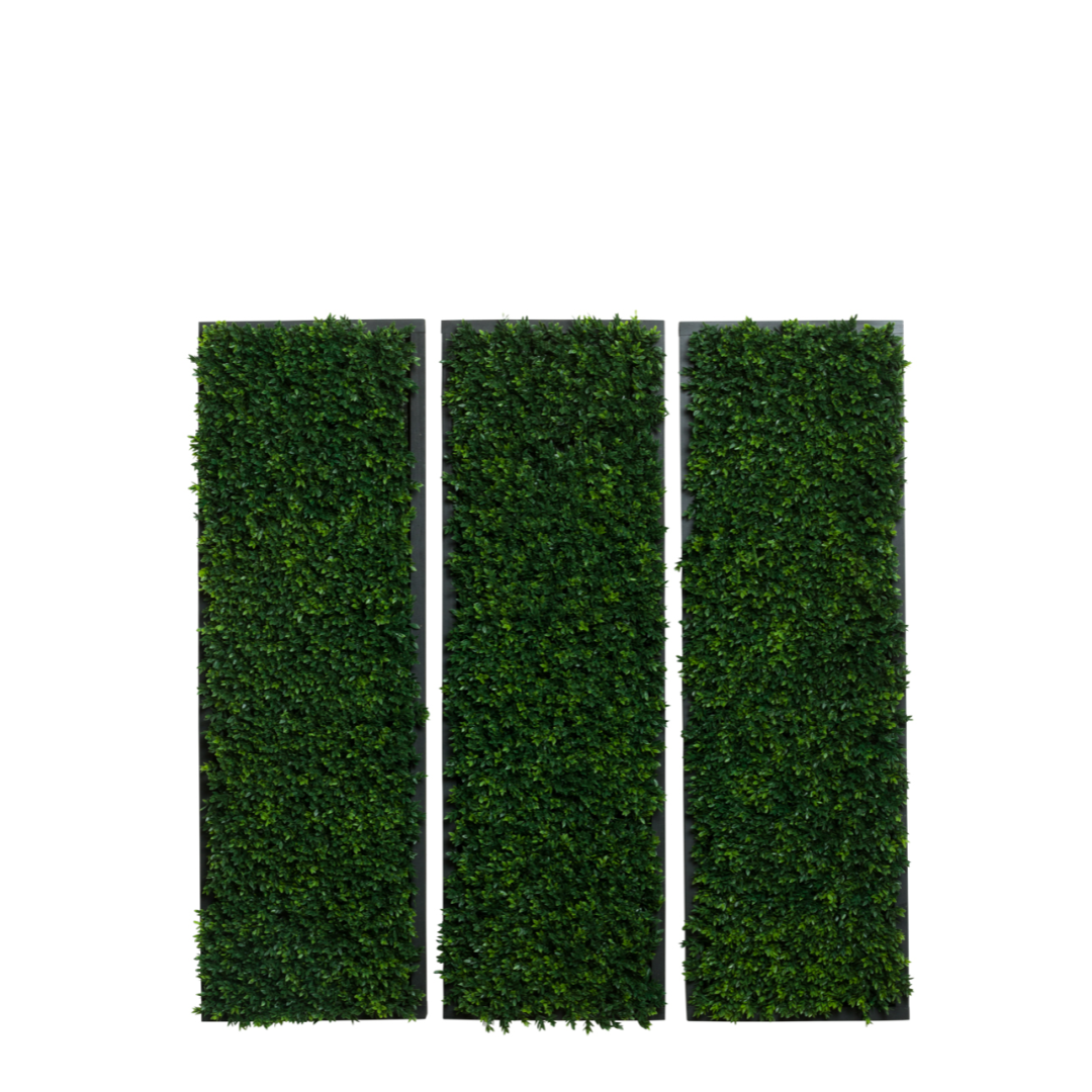 Rectangular artificial boxwood hedge wall panels in three vertical sections for indoor decor