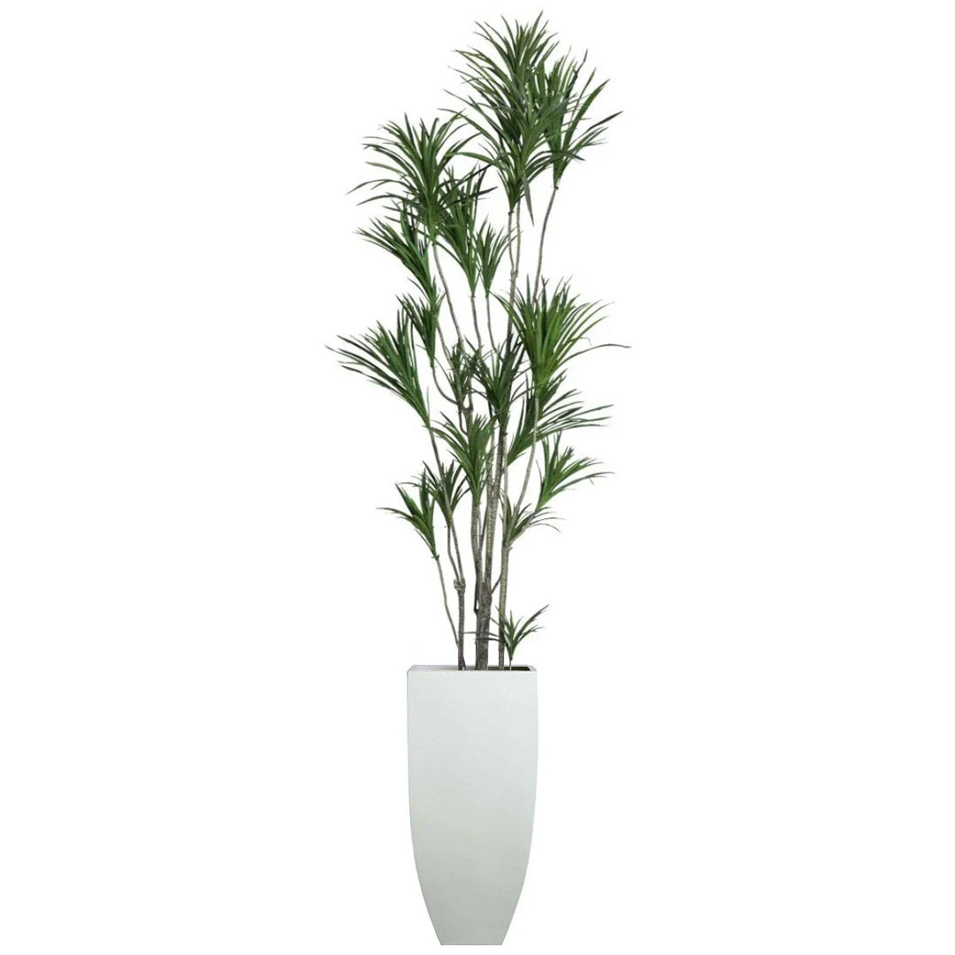 Artificial Dracaena plant with green leaves in tall white planter against white background