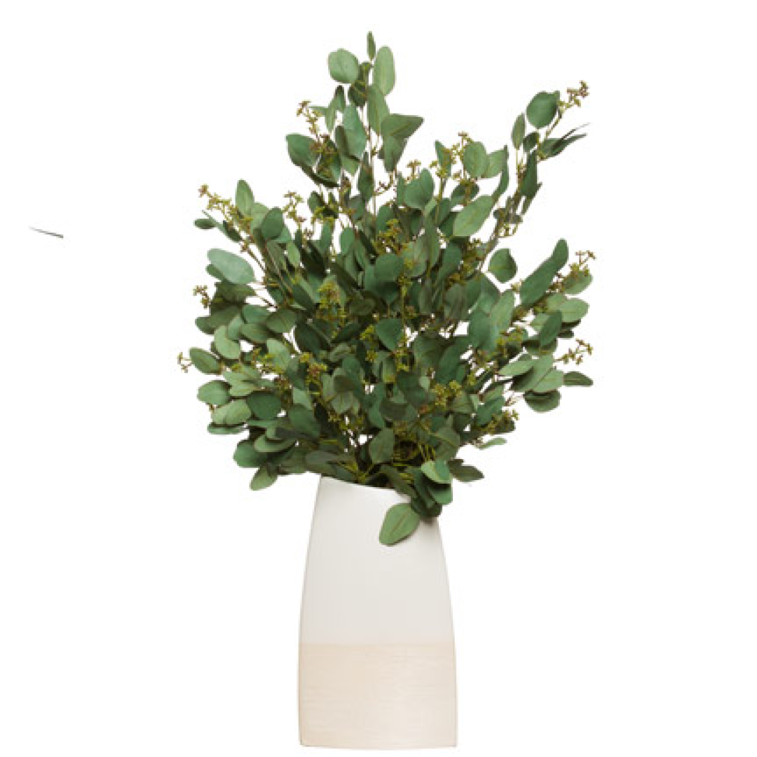 Artificial eucalyptus arrangement in a modern white ceramic vase, realistic green foliage