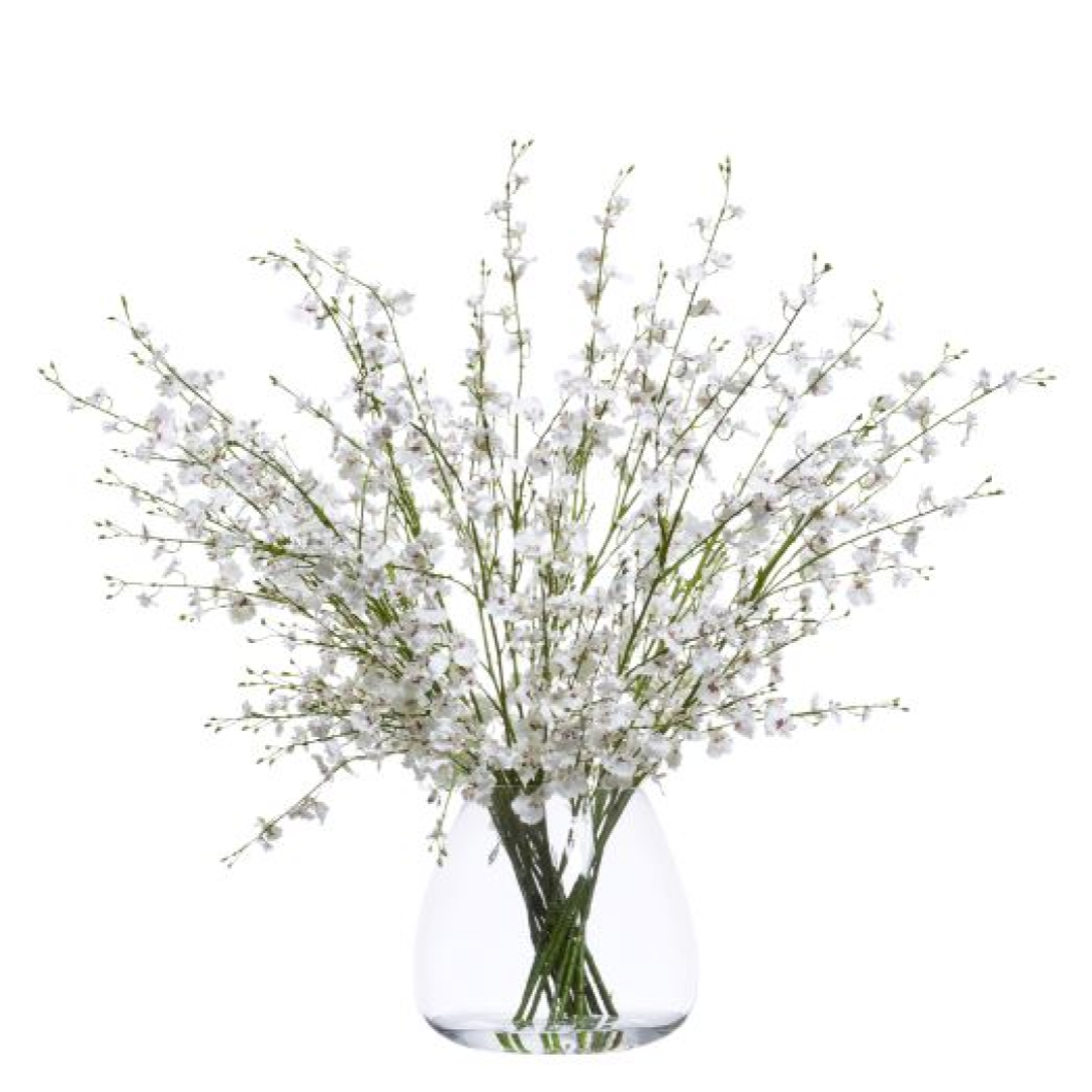 Artificial white Oncidium orchid stems arranged in a clear glass vase