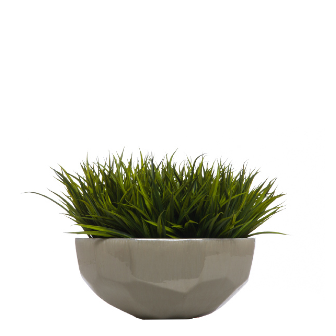 Artificial grass arrangement in a modern faceted ceramic bowl