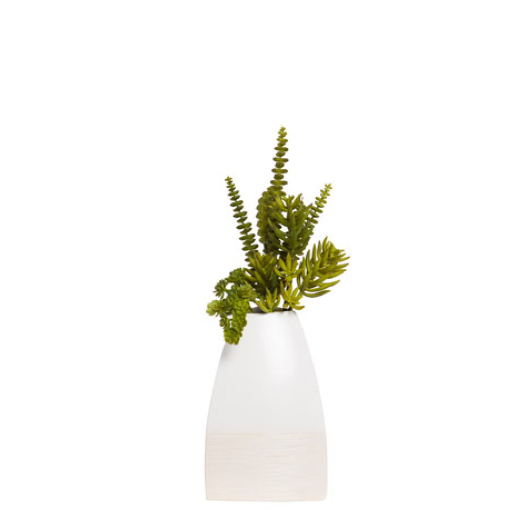 Artificial green succulent arrangement in a modern white ceramic vase