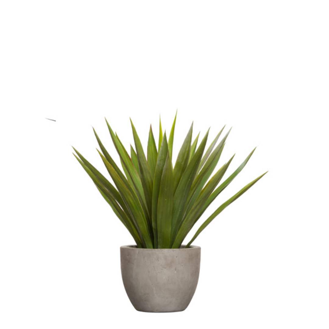 Realistic artificial green plant in gray pot for home or office decor