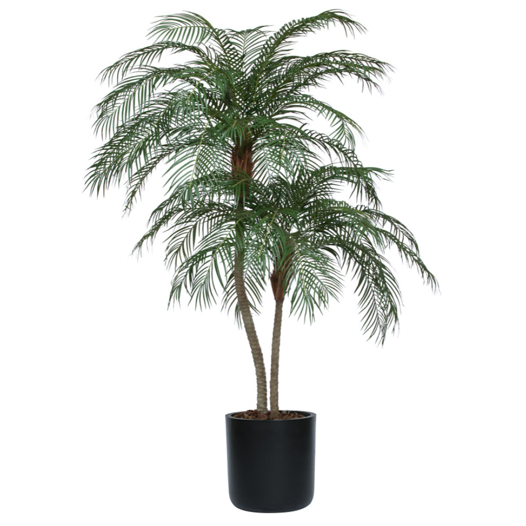 Artificial palm tree with realistic green fronds in a black pot on white background