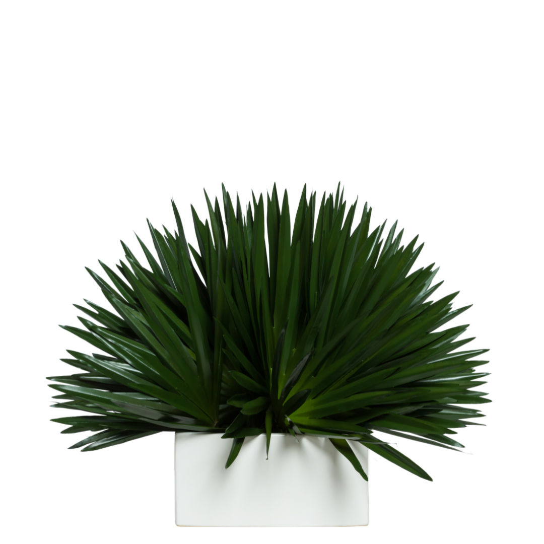 Artificial palm fan plant in modern white rectangular planter, lifelike green foliage