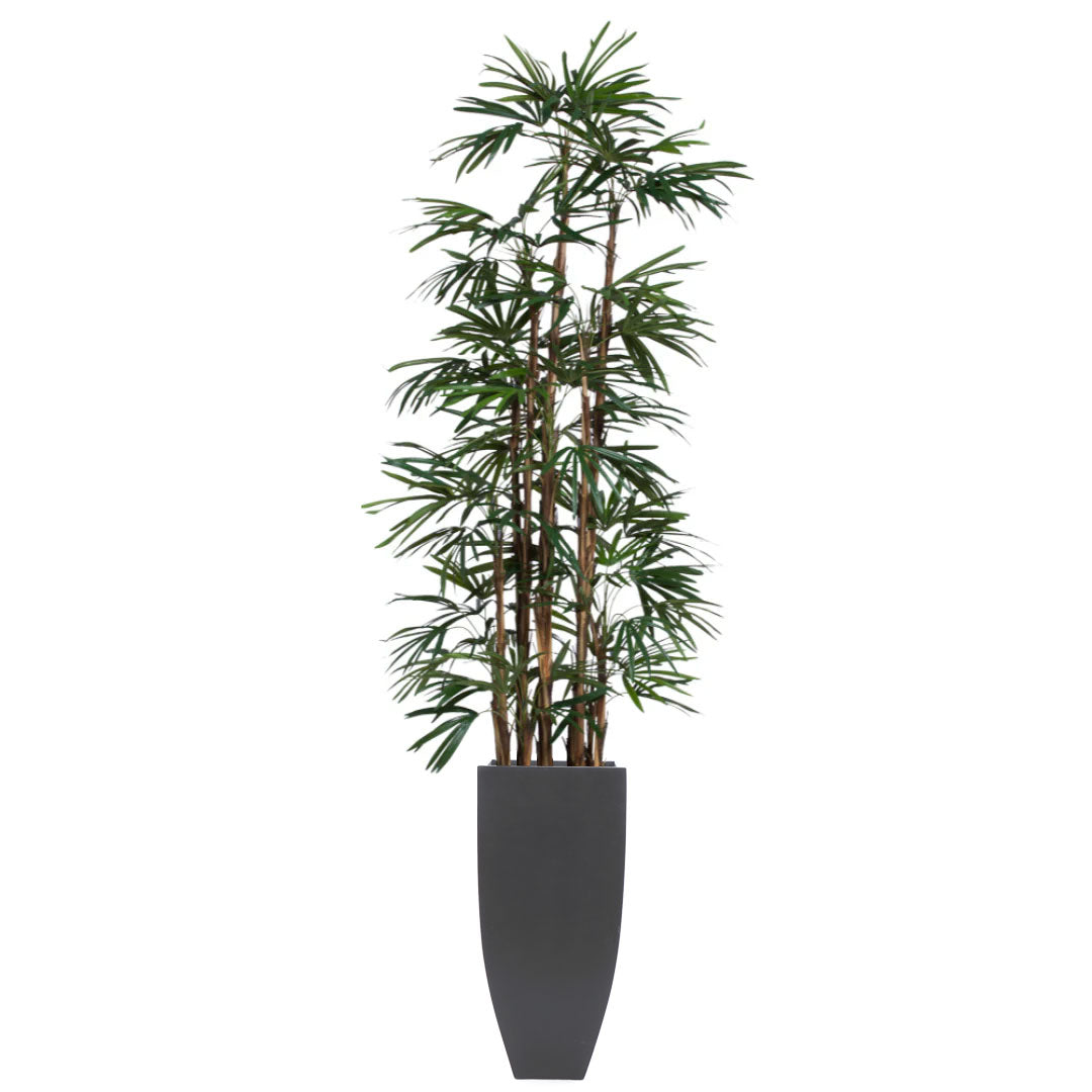 Artificial lady palm plant with slender green leaves in a tall modern black planter