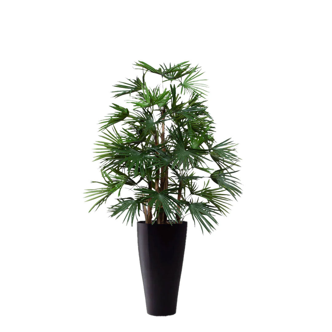 Artificial palm tree with dense green foliage in tall black planter