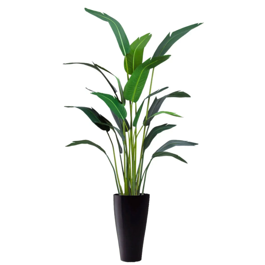 Artificial palm plant in a tall black planter, realistic green tropical foliage.