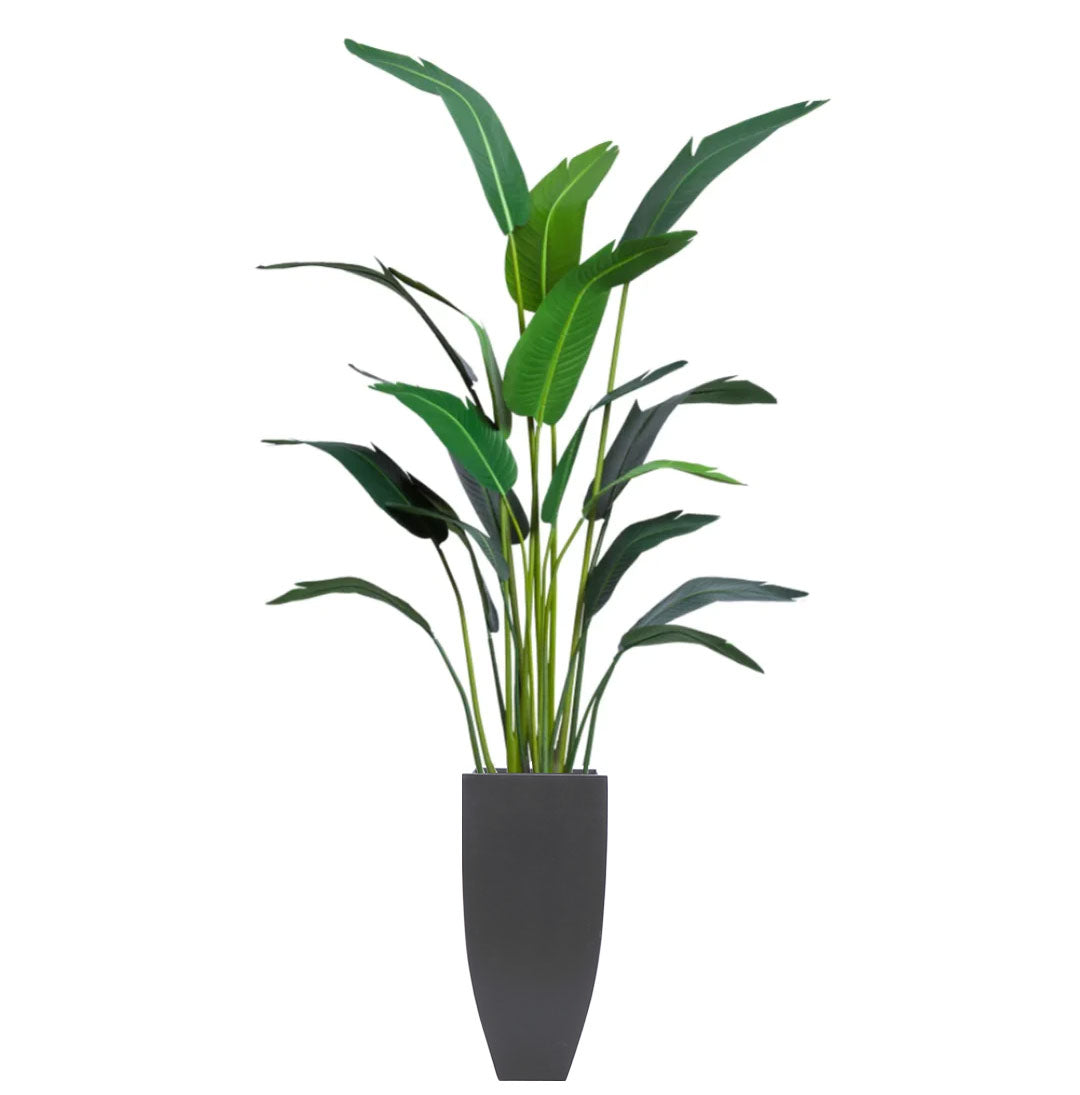 Artificial tropical palm plant in tall black planter, realistic green leaves
