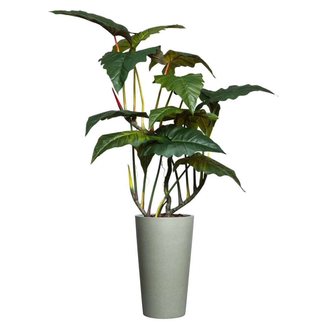 Artificial giant philodendron plant with large green leaves in a tall greystone pot