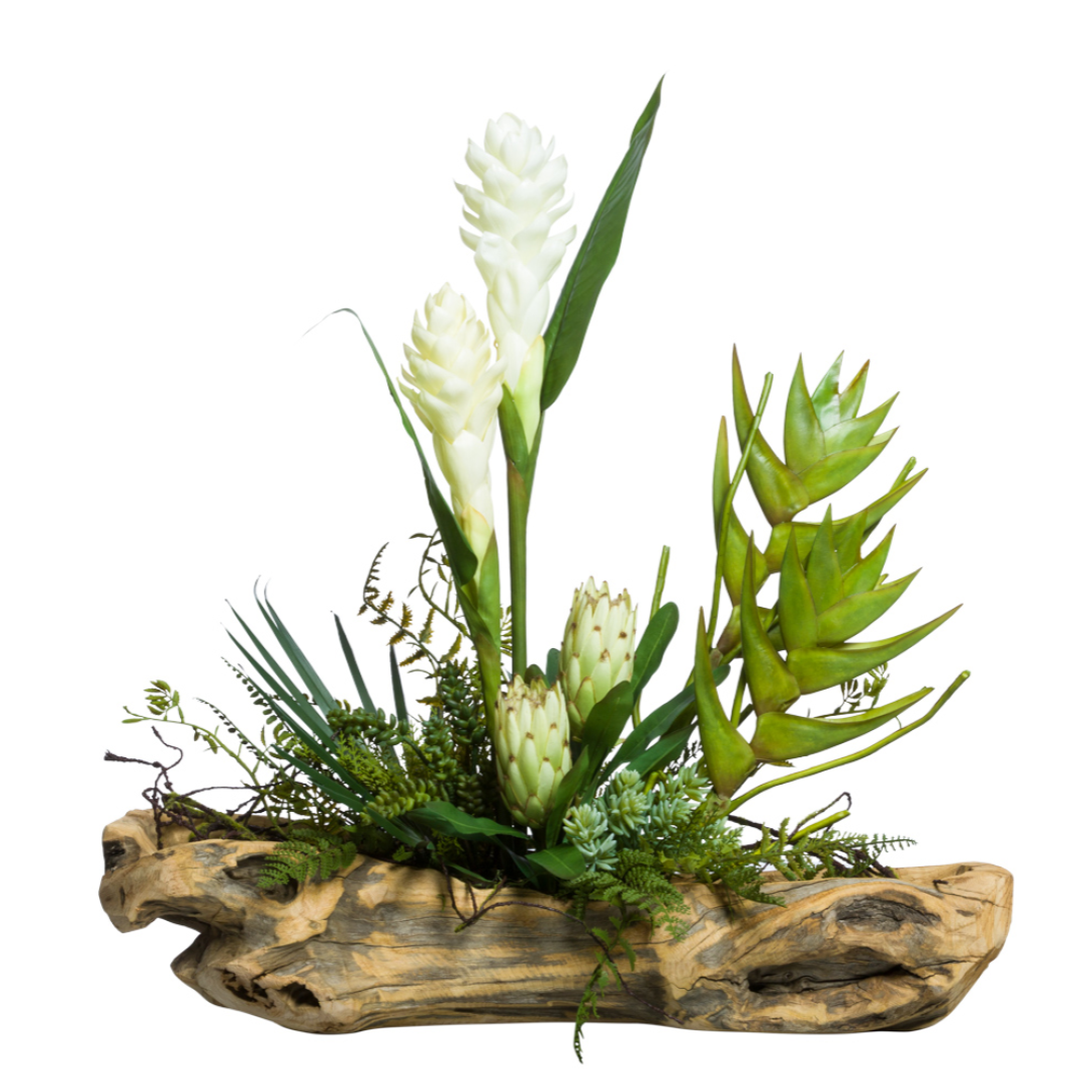 Artificial succulent and tropical flower arrangement in rustic driftwood planter