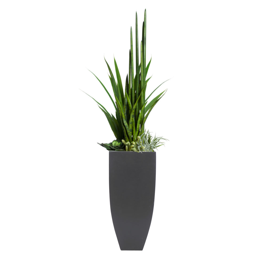 Artificial succulent and greenery arrangement in tall black planter, modern decor