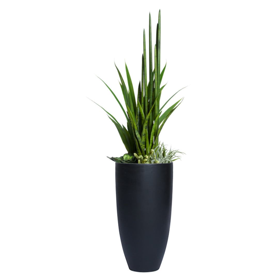Artificial succulent greenery mix in tall black planter, modern decorative accent