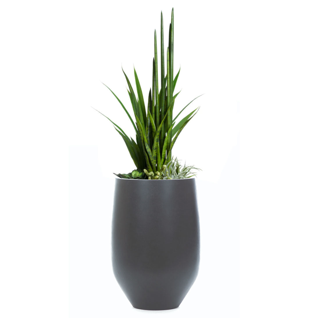 Artificial succulent greenery arrangement in sleek black tapered planter