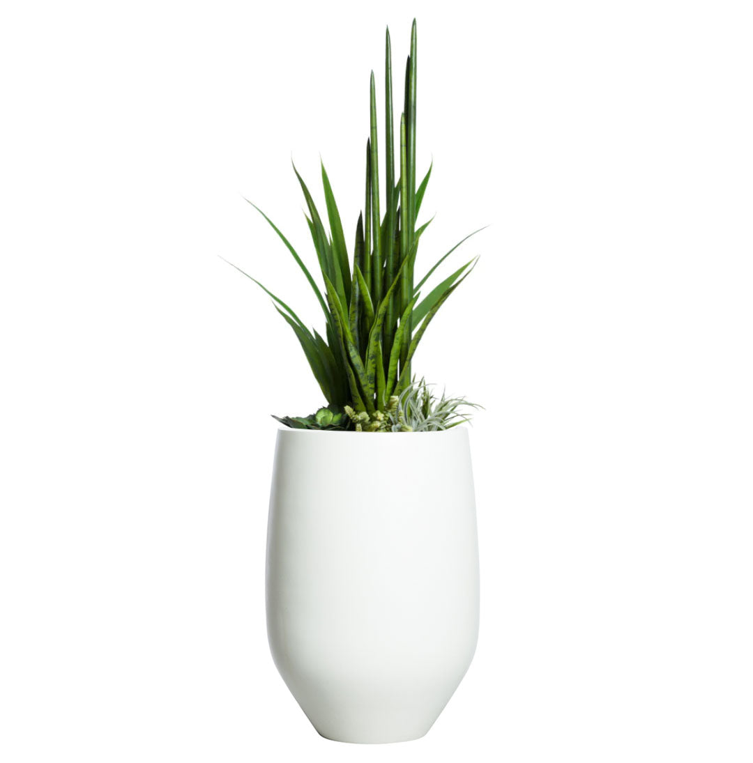 Artificial succulent and greenery mix in a modern white tapered planter