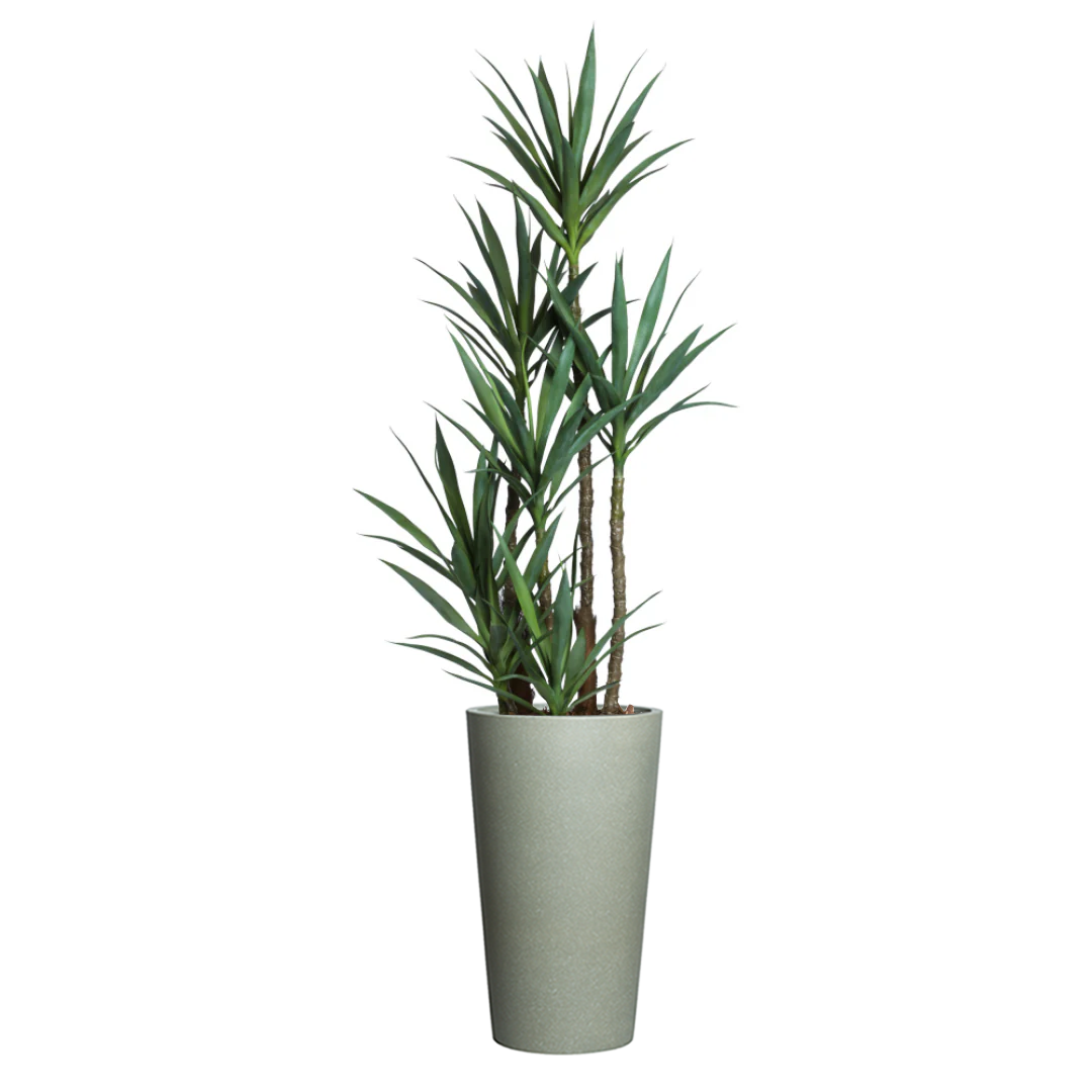 Artificial yucca plant with green leaves in tall greystone planter, white background