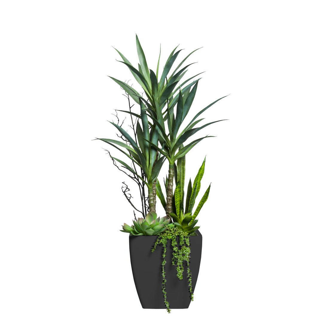 Artificial yucca plant with mixed succulents in a modern black planter on white background