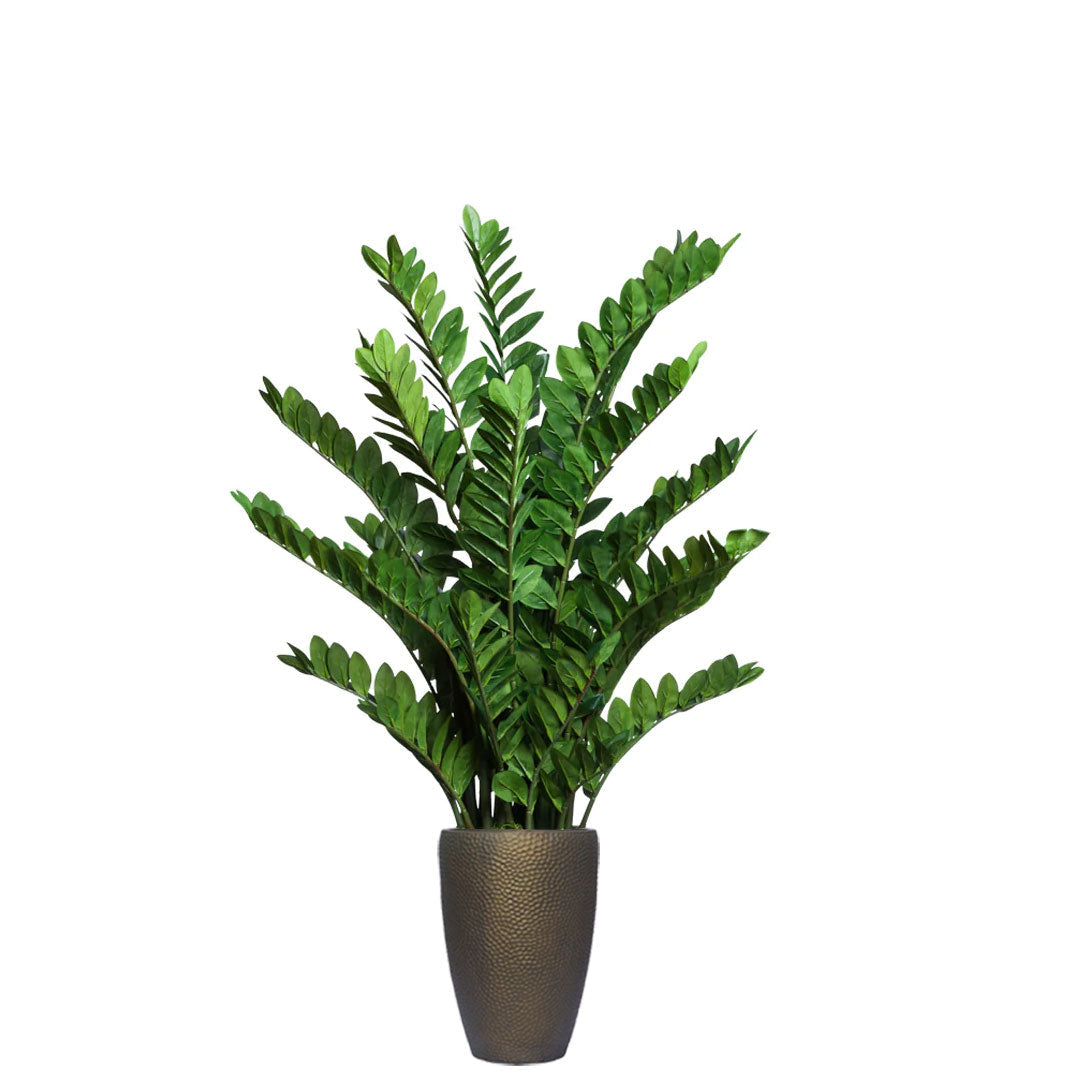 Artificial Zamiifolia plant with lush green leaves in a textured bronze planter