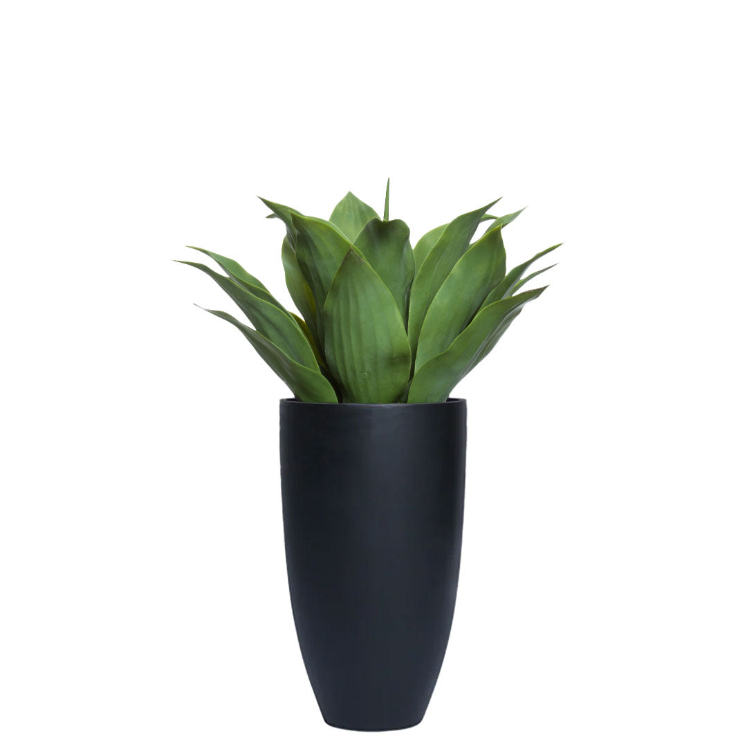 Artificial agave plant with broad green leaves in a tall, smooth black planter