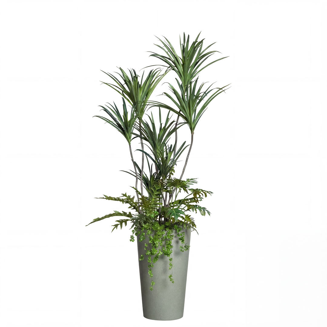Artificial dracaena plant arrangement in tall grey planter on white background