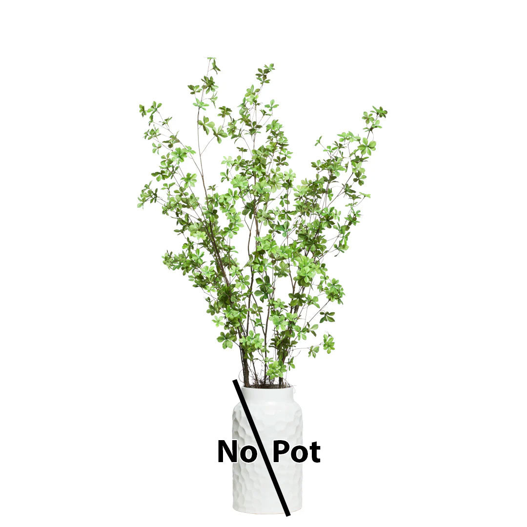 Artificial leafy green floral branches with no pot on white background