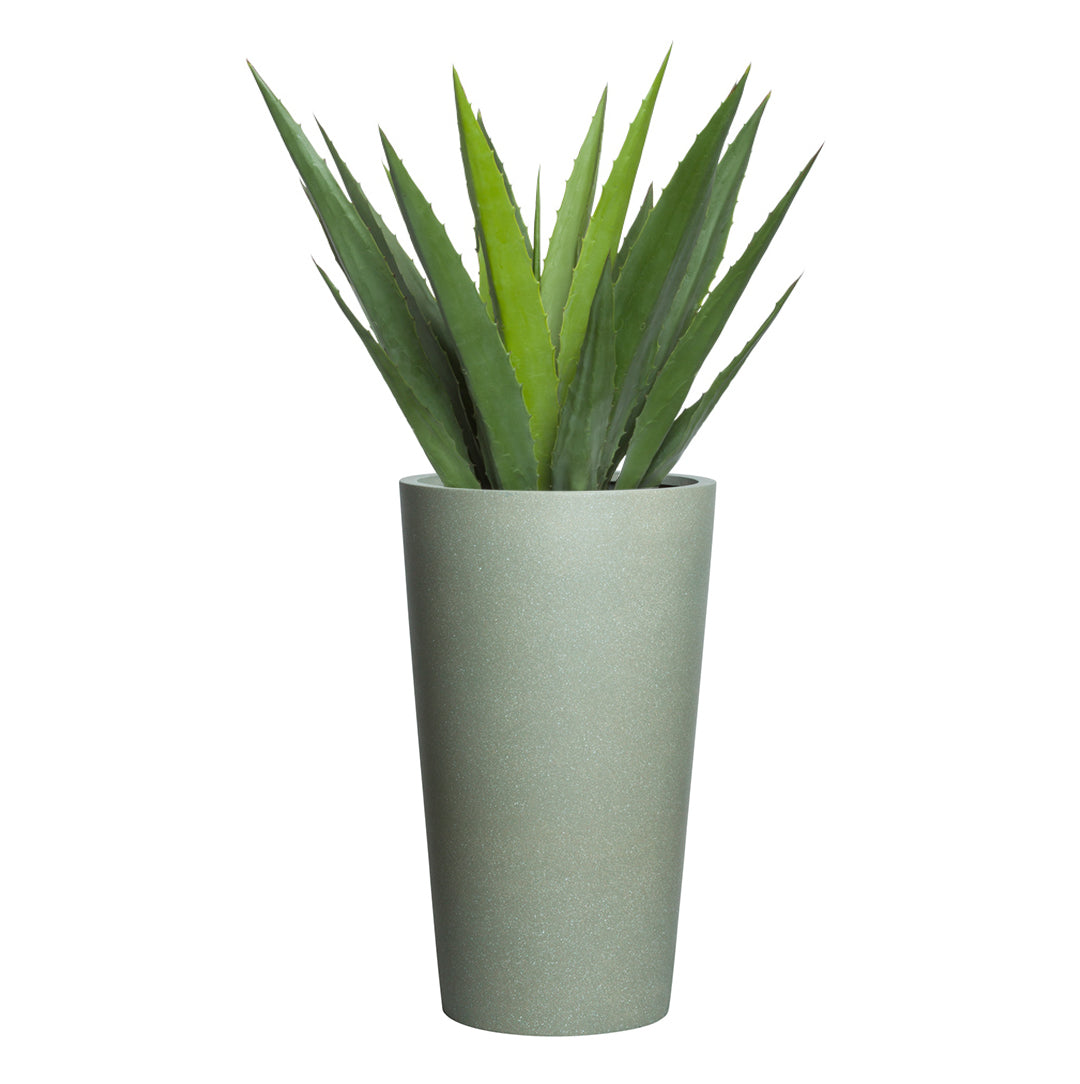 Artificial aloe plant in a tall, modern sandstone planter