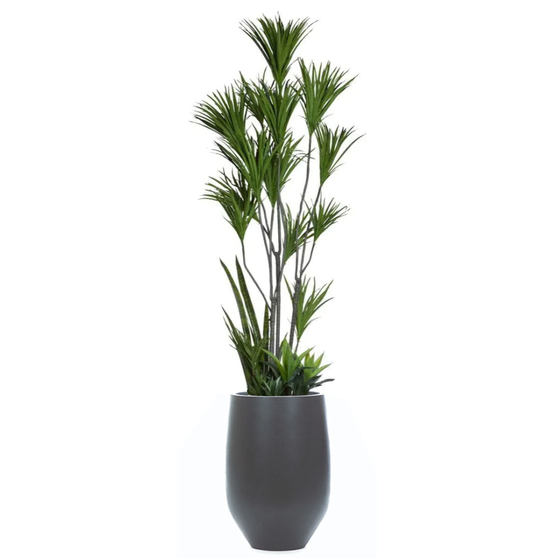 Artificial dracaena plant with green foliage in a tall black tapered pot on white background