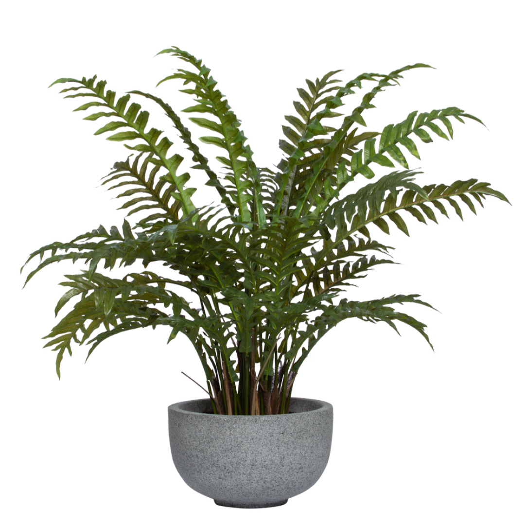 Realistic faux fern plant in round gray pot, lush green leaves, indoor decor