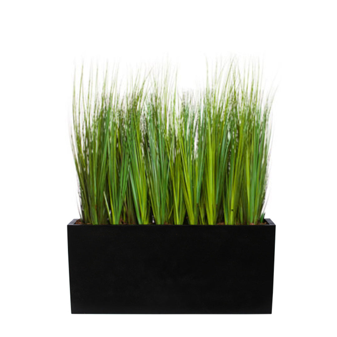 Artificial grass in a black rectangular planter, realistic faux greenery decor
