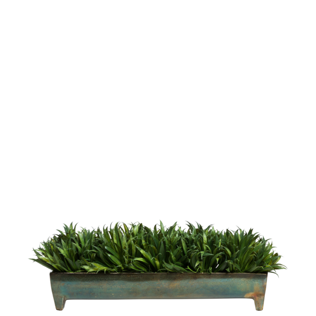 Artificial grass rye plant in a rectangular rustic metal planter