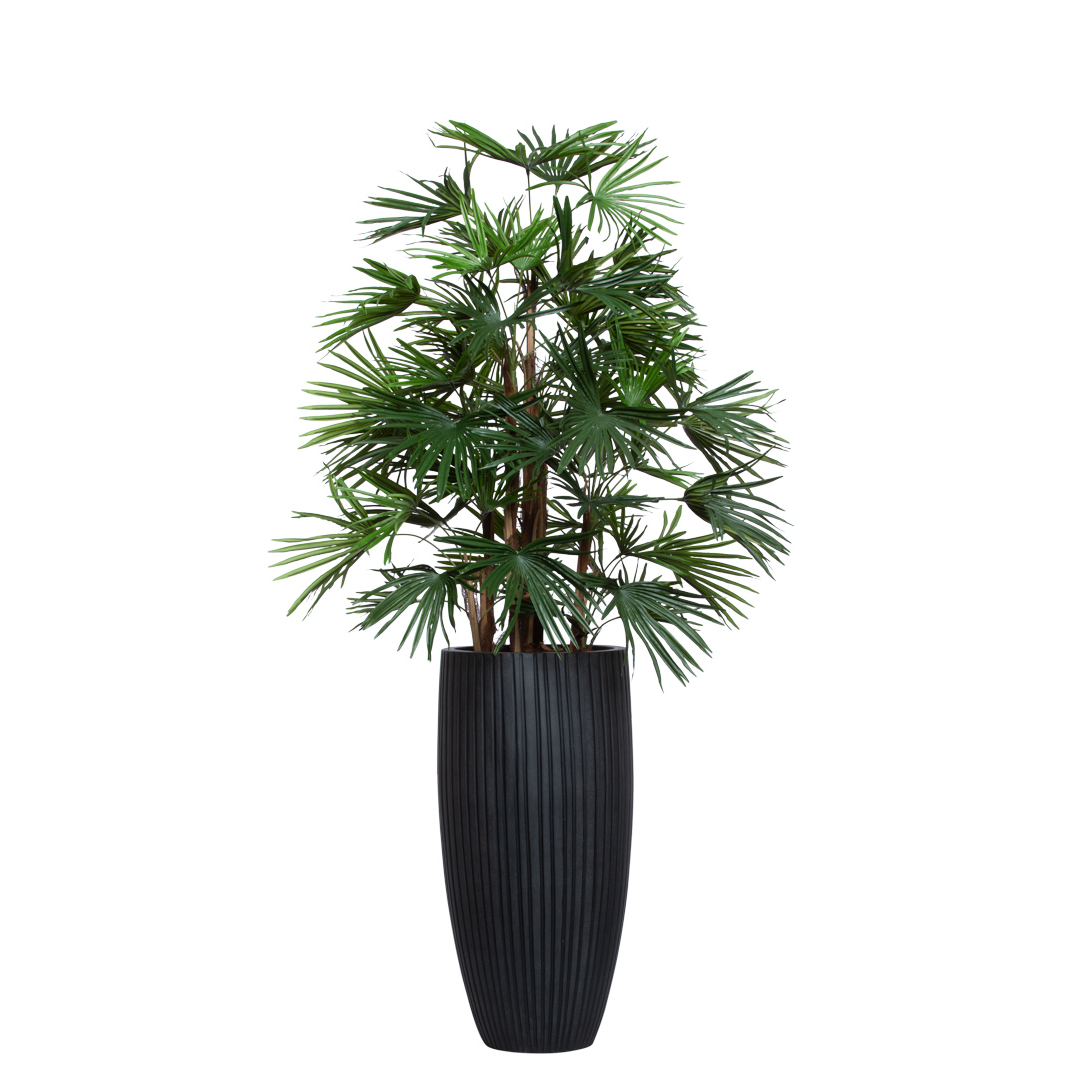 Artificial palm plant with fan-shaped leaves in tall black ribbed planter