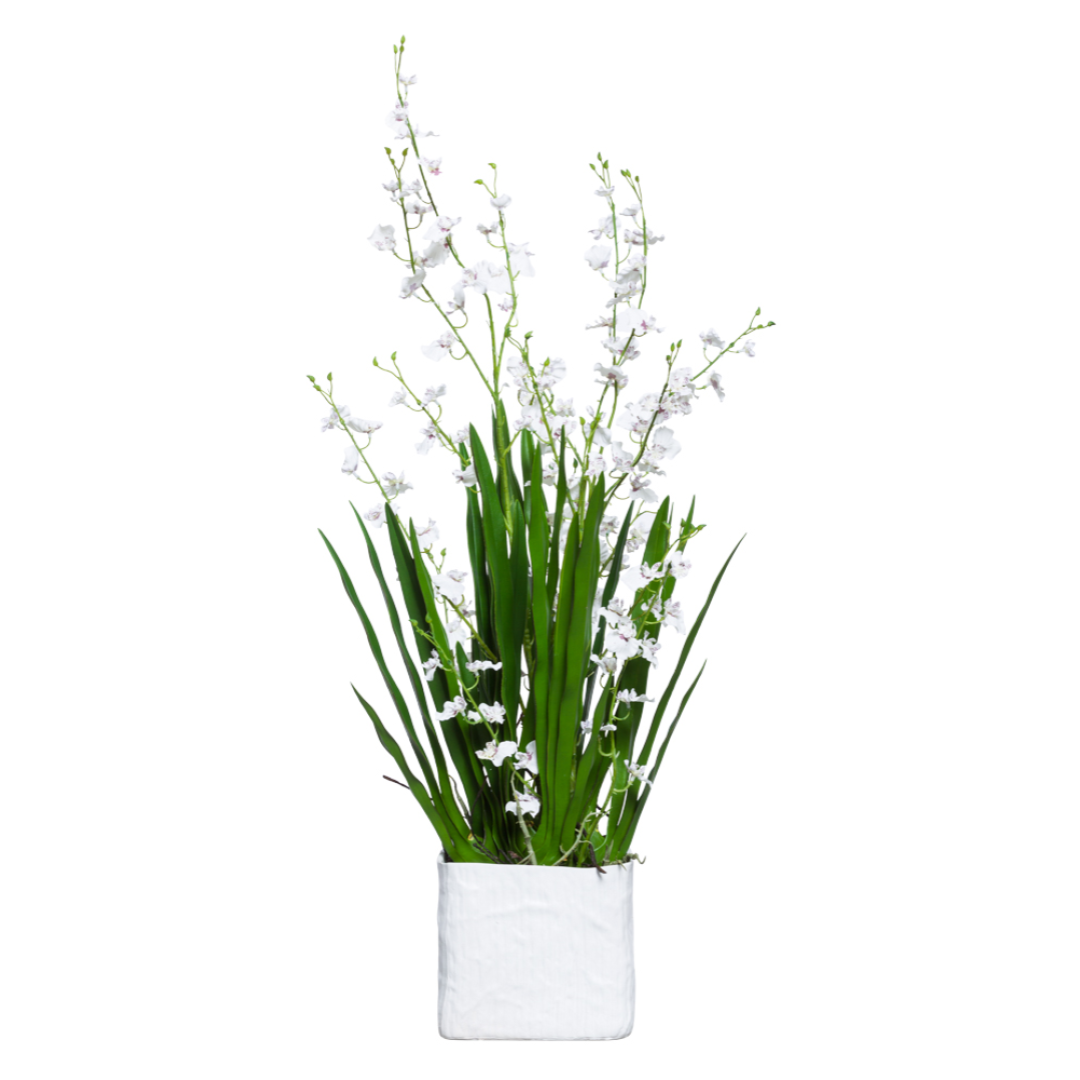 White artificial Oncidium orchid arrangement with green leaves in a modern square planter