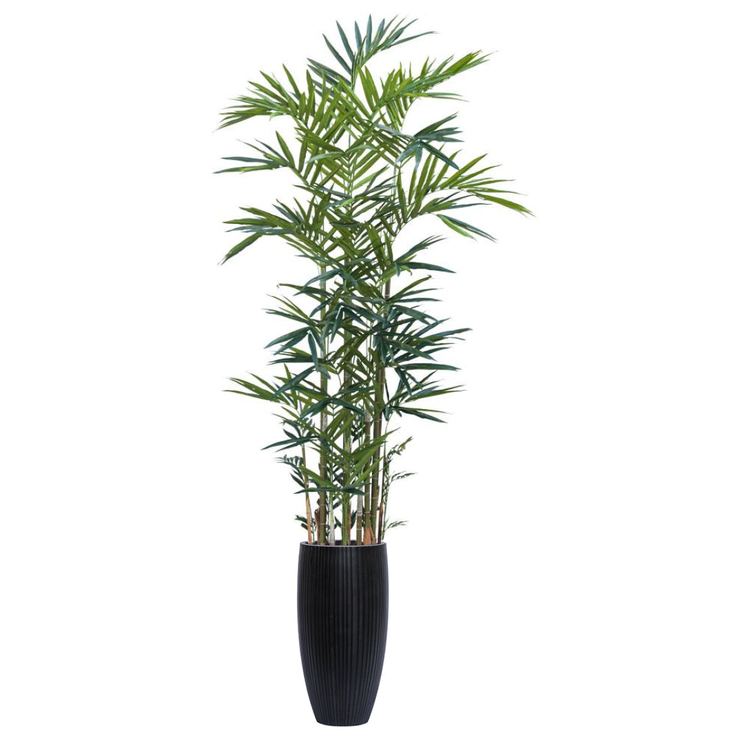 Artificial palm plant with slender green leaves in a tall black ribbed planter