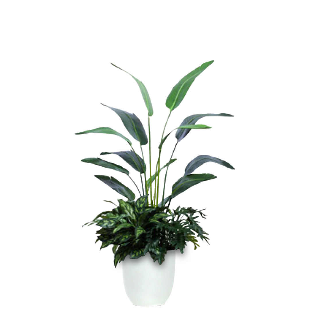 Artificial palm and foliage arrangement in a white tapered pot on white background