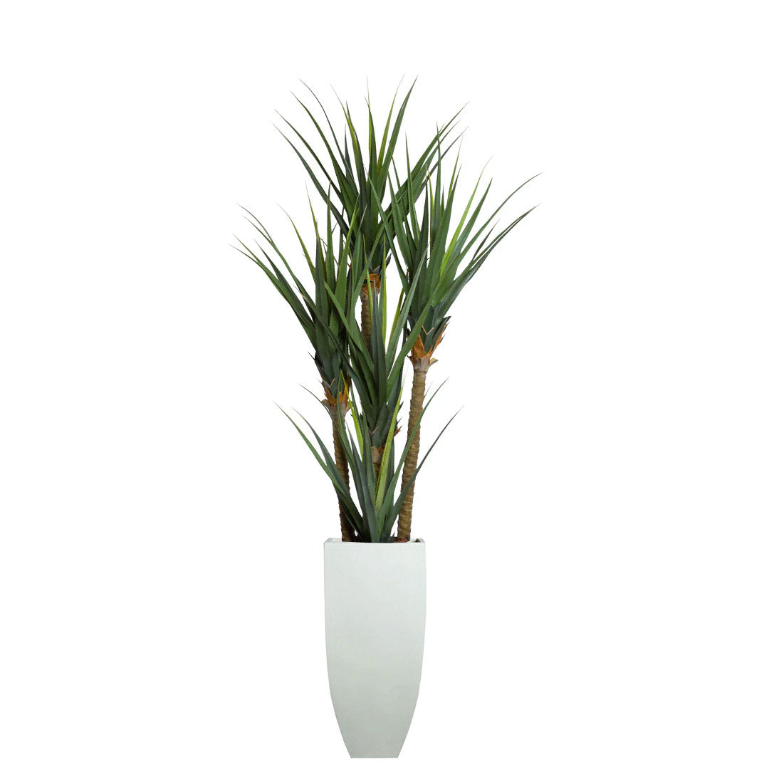 Artificial pandanus plant with long green leaves in a tall white planter, isolated on white.