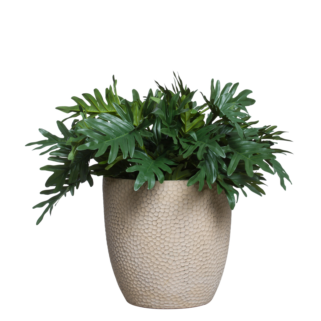 Artificial Philodendron Selloum plant in textured beige pot, realistic green foliage