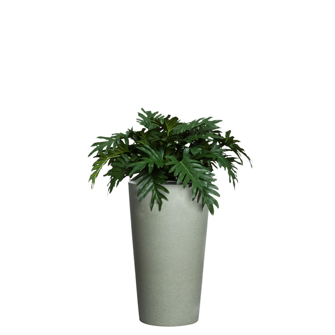Artificial Philodendron Selloum in tall grey stone planter, realistic green foliage