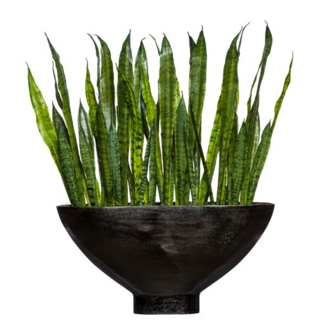 Artificial sansevieria plant in a large modern black bowl planter, green upright leaves