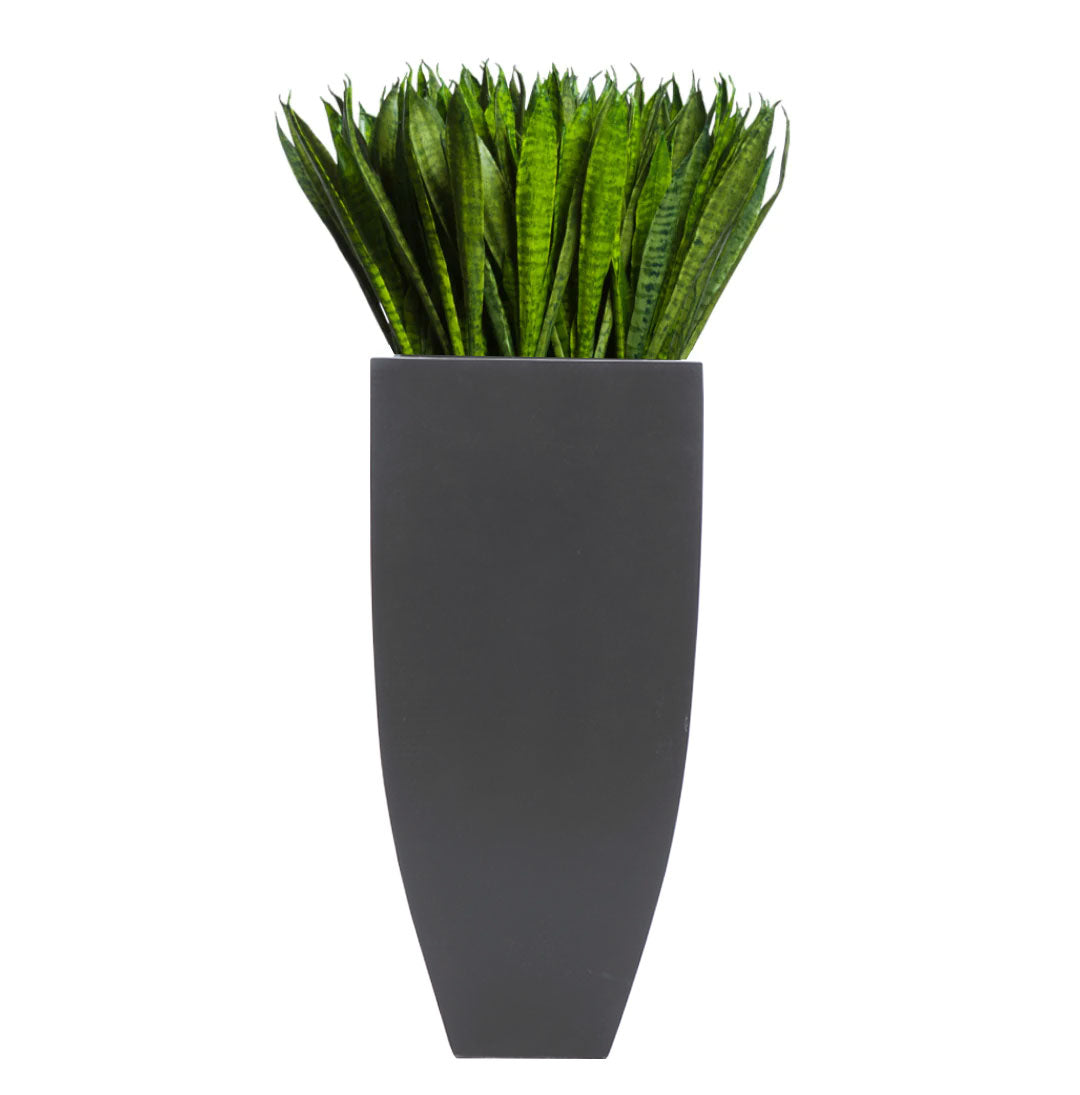 Artificial sansevieria plant in tall matte black square planter