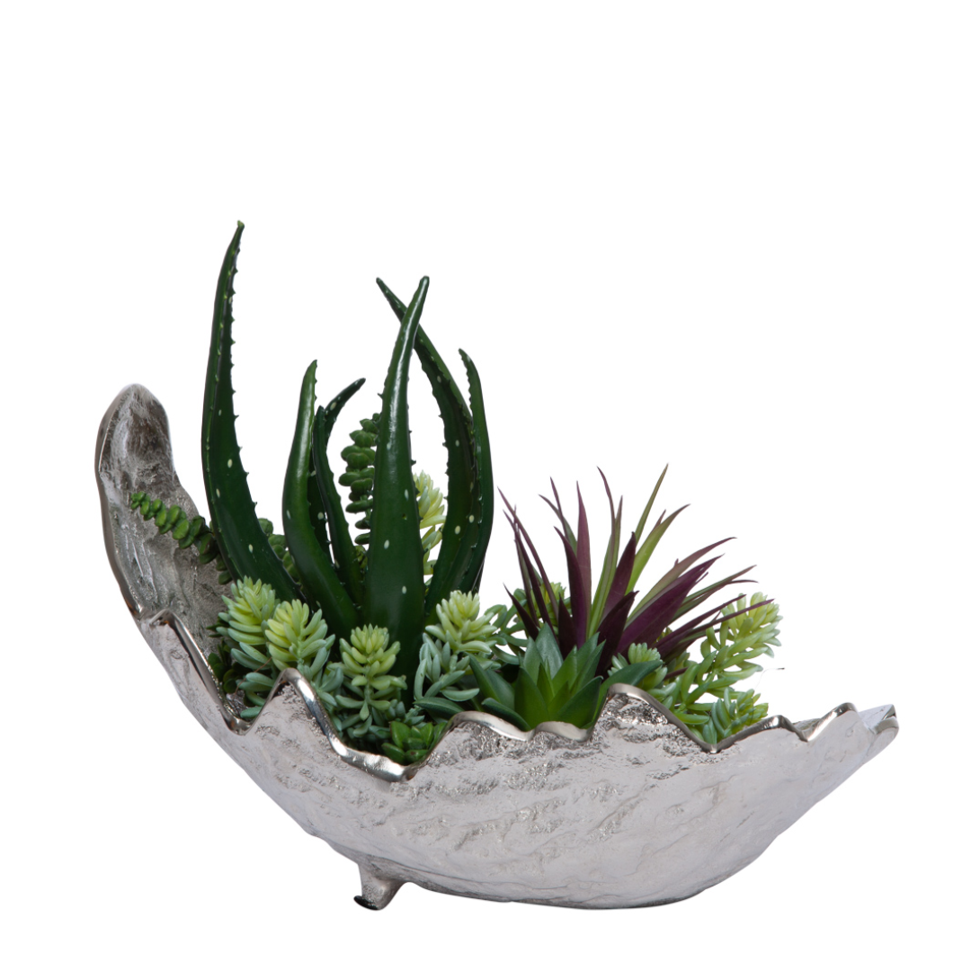 Artificial succulents arrangement in a metallic, irregularly shaped decorative bowl