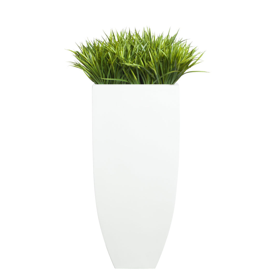 Artificial sword grass plant in a modern white rectangular planter on a white background