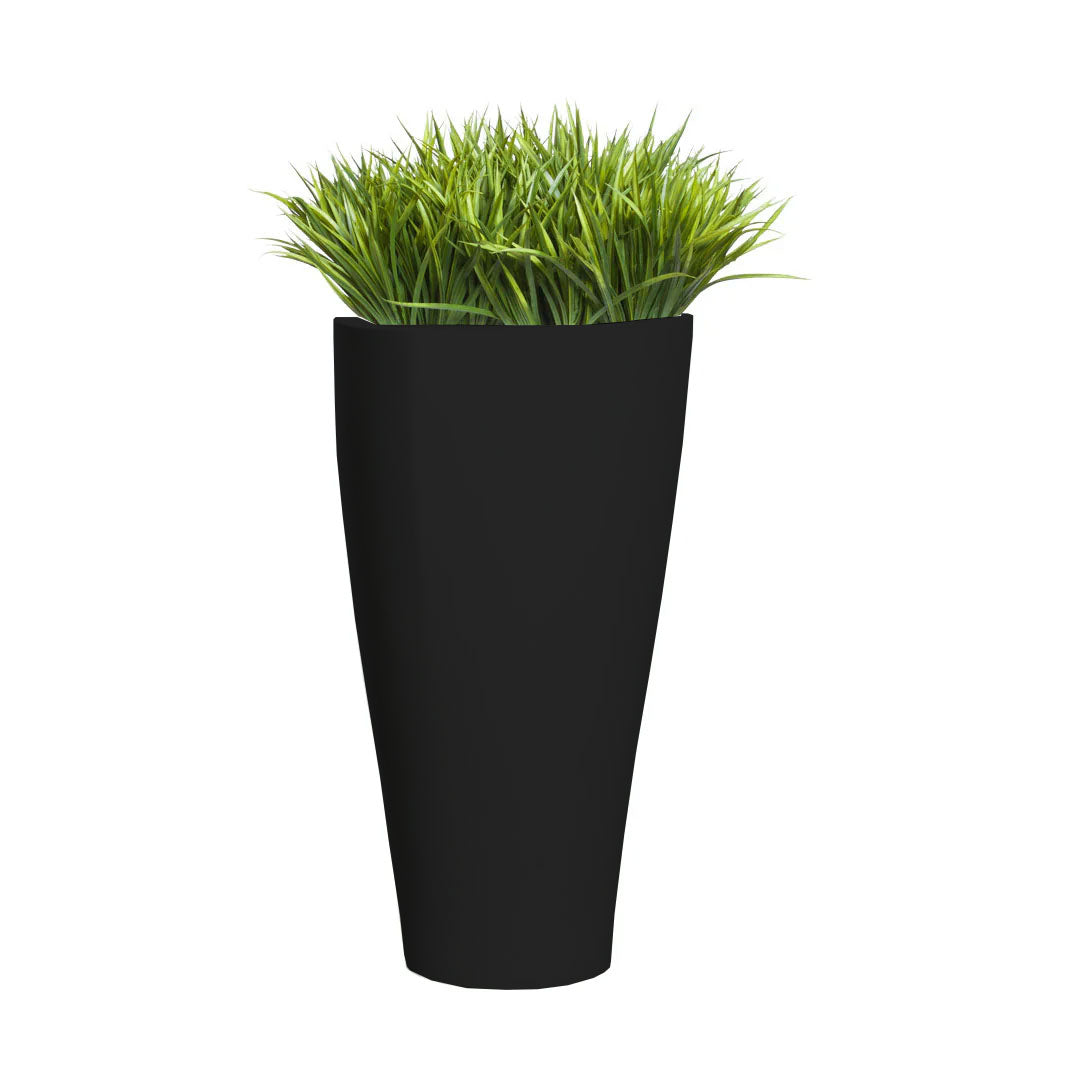 Artificial sword grass plant in tall black planter, isolated on white background.