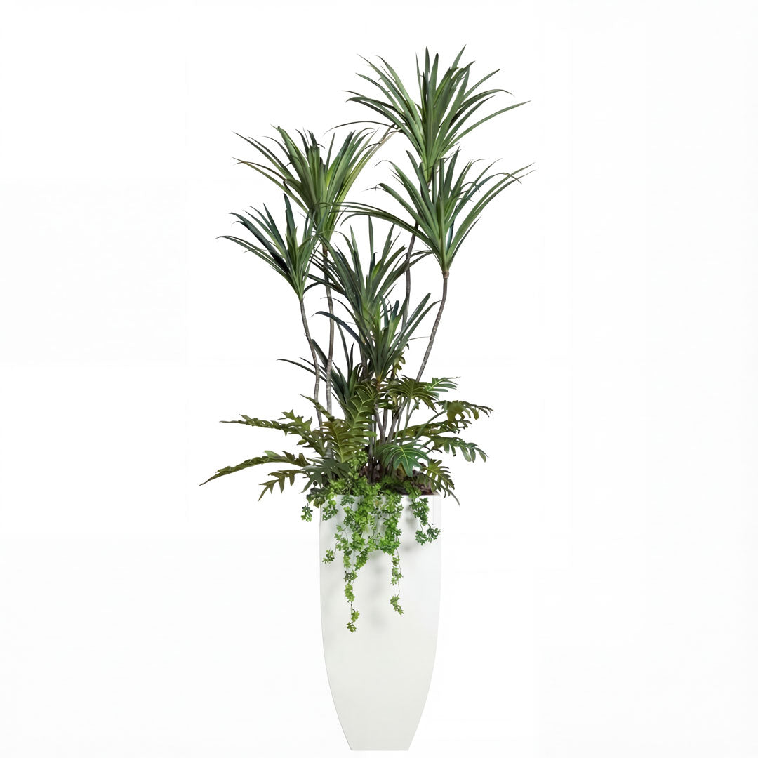 Tall artificial dracaena plant with cascading greenery in a modern white planter on white background